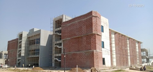 Academic block– Classroom Kota stone flooring , Classroom ceiling and Acoustic panel, HVAC ducting insulation, Roof tile work in progress.