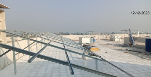 LIBRARY (Internal)– Solar panel work in progress. Terrace Tile work in progress.