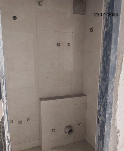Hostel Block H5 (Internal)– Toilet tile work in progress. Electrical wiring and testing work is in progress.