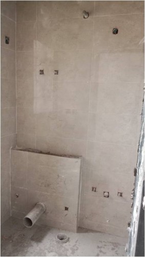 Hostel Block H2 (Internal)– Window installation work in progress. Toilet tile work is in progress