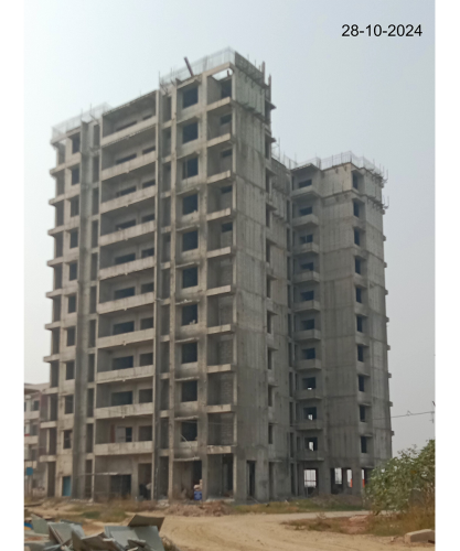 Non-Teaching Staff Residence –Plaster work in progress. Parapet steel binding work in progress.